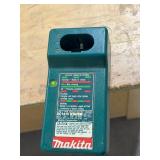 Makita 6233D cordless 3/8" driver drill with 1422 battery and DC1410 charger in case