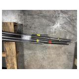 Black pipe bars, various lengths with red pipe clamps that have swing handles