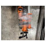 Pipe bars, various lengths with orange pipe clamps that have swing handles