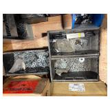 Pallet of Hardware, parts cabinet, a 6-shelf open metal storage unit, a black heavy-duty rail bin rack.