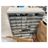 Pallet of Hardware, parts cabinet, a 6-shelf open metal storage unit, a black heavy-duty rail bin rack.