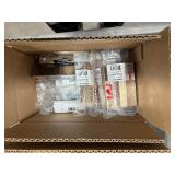 Utility Cart with slanted plastic bins holding hardware, box of coiled nails, and other items.