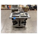 ULine Utility Cart with slanted plastic bins holding hardware and other items.