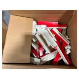 (2) pallets of adhesive clips