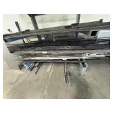 Assorted lot of metal scraps, some beams are 24’ long. Note: Shelving not included