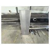 Assorted lot of metal scraps, some beams are 24’ long. Note: Shelving not included