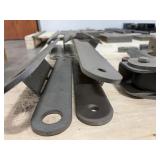 Flat bar braces, leaf springs, steel L-shaped brackets, steel slotted plates