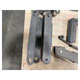 Flat bar braces, leaf springs, steel L-shaped brackets, steel slotted plates