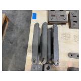 Flat bar braces, leaf springs, steel L-shaped brackets, steel slotted plates