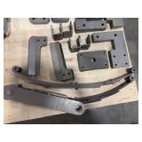 Flat bar braces, leaf springs, steel L-shaped brackets, steel slotted plates