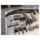 Flat bar braces, leaf springs, steel L-shaped brackets, steel slotted plates
