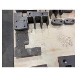 Flat bar braces, leaf springs, steel L-shaped brackets, steel slotted plates