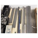 Steel tubes, bolts, steel angle bars, dowel pins, shelf brackets, u-shape brackets, figure-8 bracket