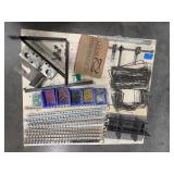 Industrial rail with heavy-duty clips, corner brackets, screws, hex couplers, and more