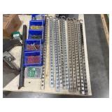 Industrial rail with heavy-duty clips, corner brackets, screws, hex couplers, and more