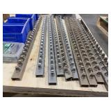 Industrial rail with heavy-duty clips, corner brackets, screws, hex couplers, and more