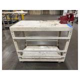 Mobile workbench with adjustable side slats Measures 43" x 24". Wilton vice grip