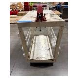 Mobile workbench with adjustable side slats Measures 43" x 24". Wilton vice grip