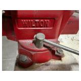 Mobile workbench with adjustable side slats Measures 43" x 24". Wilton vice grip