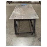 Mobile steel workbench with locking castors. 37” x 20”