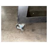 Mobile steel workbench with locking castors. 37” x 20”