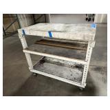 Mobile workbench with open sides and a middle and lower shelf. 43” x 24"