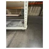 Mobile workbench with open sides and a middle and lower shelf. 43” x 24"