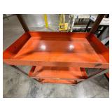 5-tier orange industrial shelf unit with 3" deep trays to prevent tools from slipping.