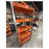 5-tier orange industrial shelf unit with 3" deep trays to prevent tools from slipping.