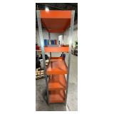 5-tier orange industrial shelf unit with 3" deep trays to prevent tools from slipping.