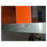 5-tier orange industrial shelf unit with 3" deep trays to prevent tools from slipping.