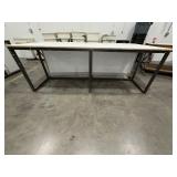 Steel base w/laminated 4x8 top: bottom has one side open, one side retrofitted w/drawers & 2-door cabinet