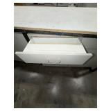 Steel base w/laminated 4x8 top: bottom has one side open, one side retrofitted w/drawers & 2-door cabinet