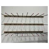 (3) 10’ long wall mounted straight bar pegs