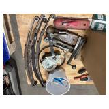 Leaf springs, cable wench, cold packs, stick electrode holder, grout trowels, gas springs, cable