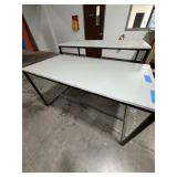 2 task tables laminated tops and black metal frames. Measurements 60" x 30" x 34" and 60" x 30" x 39"