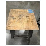 (3) work benches, metal w/wood top, all-wood table, black metal cart on casters. (1)stool w/metal frame