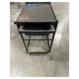 (3) work benches, metal w/wood top, all-wood table, black metal cart on casters. (1)stool w/metal frame