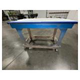 (2) workspace on carts with locking casters; (2) workspace tables with metal legs