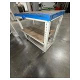 (2) workspace on carts with locking casters; (2) workspace tables with metal legs