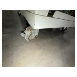 (2) workspace on carts with locking casters; (2) workspace tables with metal legs