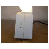 This is a vintage Bio-Brite The SunRise Clock model 5G63.