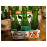 7-up bottles and crate