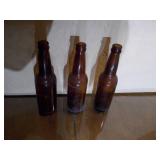 Brown bottles and Grain belt cardboard box