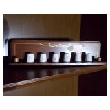 Collectable Thimbles on a Shelf