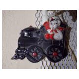 This is a vintage ceramic train table lamp.