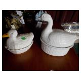 The image displays 2 white ceramic duck-shaped soup tureens with a lids.
