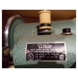 vintage sewing machine, identified as a potentially a White Sewing Machine from the mid-century era.