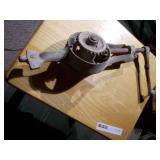 antique breast drill or an ice cream maker.