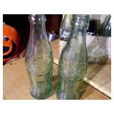 vintage collectible pack of Coca-Cola glass bottles in their original cardboard carrier.
